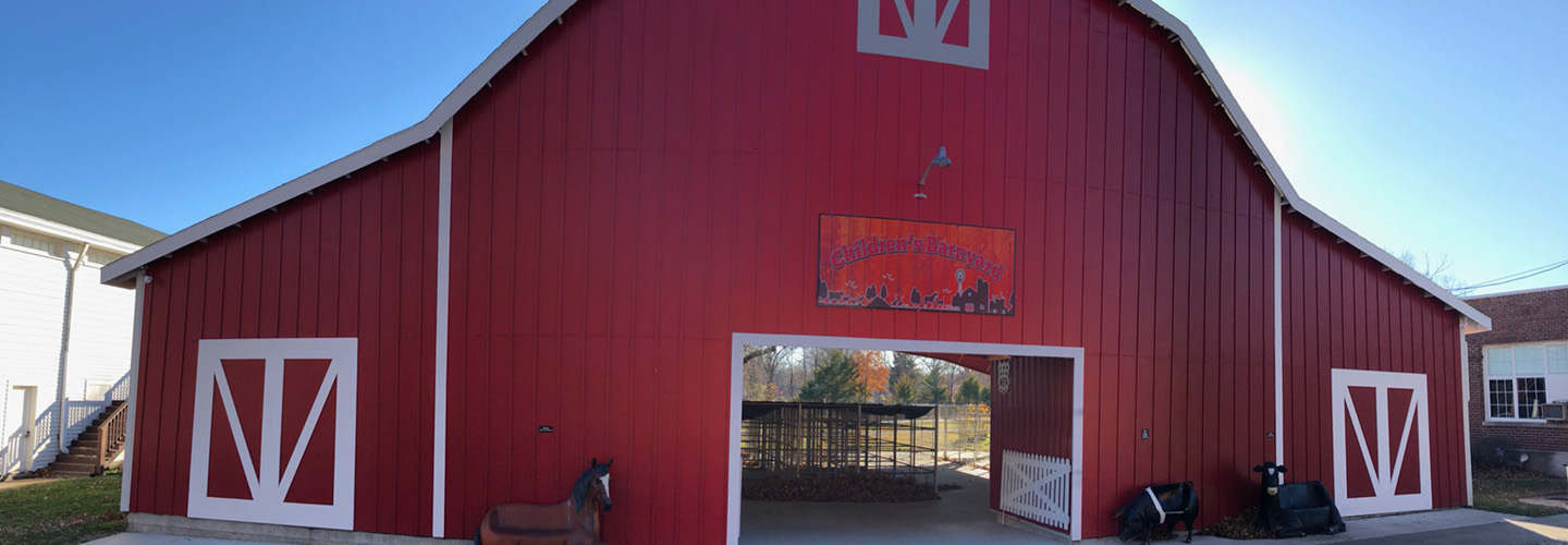 The exterior of the Children's Barnyard with improvements including animal shaped benches