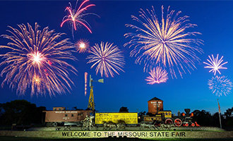 Trails End Monument with Fireworks going off above it