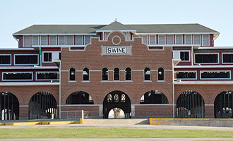 The swine barn on the Missouri State Fairgrounds on a sunny day