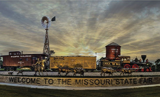A scenic view of the Trail's End landmark at sunset